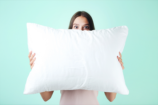 Holding a Mediflow Water Pillow