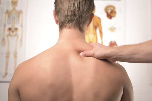 Chiropractor pinching neck